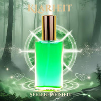 Seelen Spray Klarheit in einer eleganten Glasflasche mit goldfarbener Verschlusskappe und leuchtend grüner Füllung – energetisches Aura-Spray zur Förderung von geistiger Klarheit, innerer Ausrichtung und klarer Wahrnehmung.