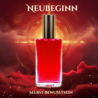 Seelen Spray Neubeginn in einer eleganten Glasflasche mit goldfarbener Verschlusskappe und kraftvoll roter Füllung – energetisches Aura-Spray zur Aktivierung von Selbstbewusstsein, Tatkraft und mutigem Aufbruch in neue Lebensphasen.